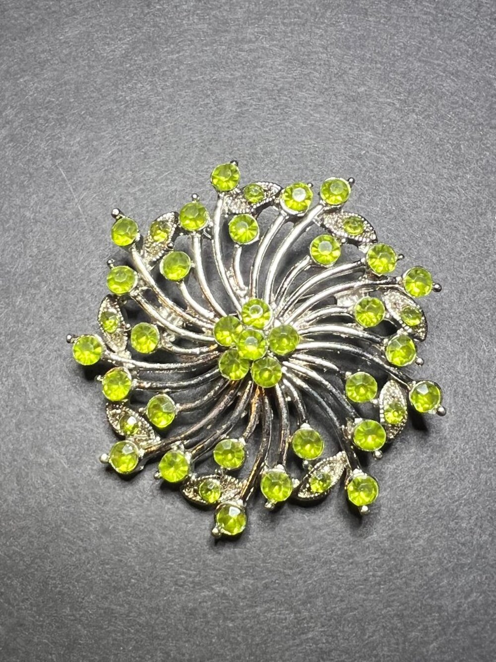 Vintage Silver Tone Green Rhinestone Starburst Swirl Atomic Pin Brooch 1.75"